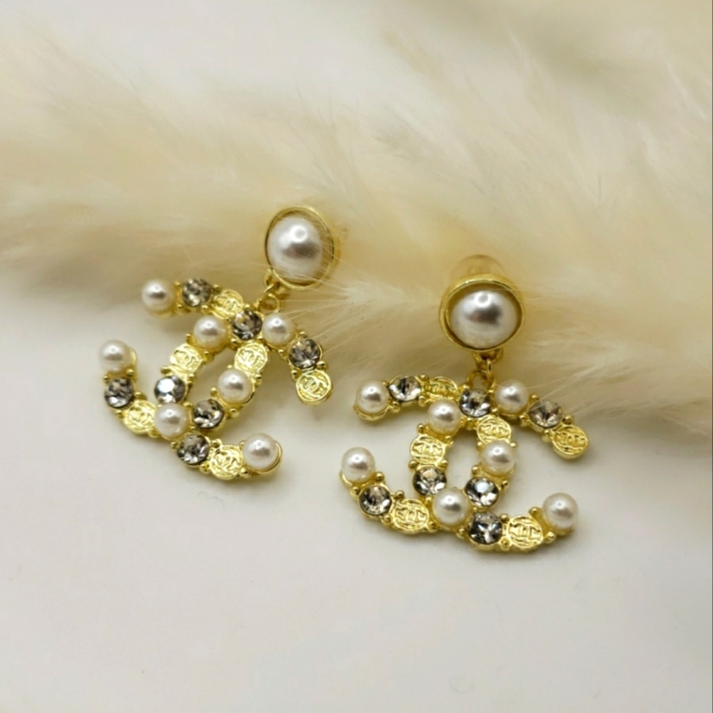 Dangling Gold pearls and cubic zirconia earrings
